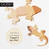 Two gecko-shaped swatches of foundation are shown, one larger and one smaller. The larger swatch has three different shades of foundation applied to it, blending from light to dark. The smaller swatch has two shades. A circular text overlay is present on t Produktbild-Vorschau