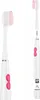 A white electric toothbrush with pink bristles, shown disassembled and assembled. Produktbild-Vorschau