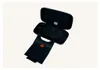 An open black travel case for a Nintendo Switch, with a black accessory holder inside. Anteprima dell’immagine prodotto