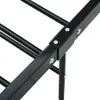 A close-up view of a black metal bed frame, showing the connection points and legs. Podgląd zdjęcia produktu