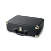A black suitcase-style record player is shown against a white background. Voir les images du produit