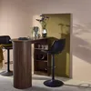 A bar table with two bar stools in a room with pink and olive green walls. Produktbild-Vorschau