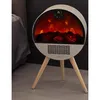 A modern electric fireplace with a realistic flame effect is placed next to a bed in a bedroom. Produktbild-Vorschau