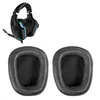 A pair of black ear pads for headphones and a pair of headphones. Produktbild-Vorschau
