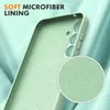 Close-up view of the inside of a green phone case, highlighting its soft microfiber lining. Produktbild-Vorschau