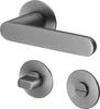 A set of door hardware, including a door handle and two rosettes, displayed against a white background. Produktbild-Vorschau