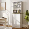 A white kitchen cabinet with a microwave and coffee maker on top, placed in a dining room setting. Podgląd zdjęcia produktu