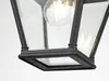 A close-up view of the bottom part of a black outdoor lantern with glass panels. Produktbild-Vorschau