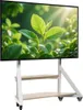 A white TV stand with two wooden shelves and wheels, displaying a nature scene on its screen. Podgląd zdjęcia produktu