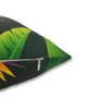 A close-up of a pillow with a tropical print. Produktbild-Vorschau
