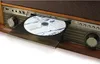 A close-up shot of a retro-style stereo system with a CD tray extended and a CD inside. Produktbild-Vorschau