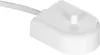 A white electric toothbrush charging base with a white cable attached, shown from a diagonal angle against a white background. Náhľad obrázku produktu