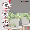 Two ceramic planters with plants on a light-colored surface, with marketing icons and text on the left side. Náhled obrázku produktu