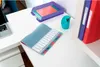 A desk with office supplies including a laptop, a file organizer, notebooks, and binders. Podgląd zdjęcia produktu