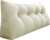 A wedge-shaped pillow with button tufting. Podgląd zdjęcia produktu