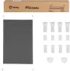 A dark gray pleated blind is shown next to its packaging and mounting accessories. Produktbild-Vorschau