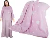 A woman wearing a pink star-patterned blanket with sleeves, shown from the front. To the right, a close-up of the blanket is displayed. Náhľad obrázku produktu