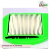 A close-up of a green vacuum cleaner filter with a small black brush. Produktbild-Vorschau
