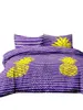 A bedding set with a pineapple pattern on a white background. Produktbild-Vorschau
