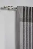 A close-up of a curtain rod with a curtain hanging from it, against a plain wall. Produktbild-Vorschau