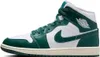A side view of a Nike Air Jordan 1 Mid sneaker in white and green. Anteprima dell’immagine prodotto