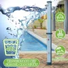A solar shower next to a swimming pool, with water splashing. Náhľad obrázku produktu