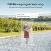 A man harvesting grapes in a vineyard, with a notification overlay. Produktbild-Vorschau