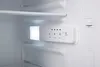 Close-up view of the inside of a refrigerator with a control panel. Produktbild-Vorschau