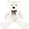 A white teddy bear with a checkered bow tie is sitting on a white background. Voir les images du produit
