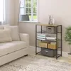 A shelving unit in a living room setting next to a couch. Náhľad obrázku produktu