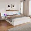 A white modern bed with LED lighting in a bedroom setting. Produktbild-Vorschau