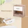 A diagram showing the dimensions of a nightstand and its drawer, with a partial view of the nightstand itself. Podgląd zdjęcia produktu