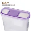 Close-up of the top of a clear plastic food storage container with a purple lid. Anteprima dell’immagine prodotto