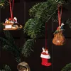 Christmas ornaments hanging on a fir tree branch. Náhľad obrázku produktu