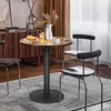 A round bistro table with two chairs in a dining room setting. Produktbild-Vorschau