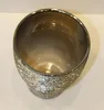 A top-down view of a silver ceramic pot with a textured exterior. Produktbild-Vorschau