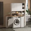 A modern laundry room with a washing machine, storage cabinets, and a bathtub in the background. Produktbild-Vorschau