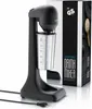 A black drink mixer with a silver cup, shown next to its packaging which features images related to fitness and protein powder. Produktbild-Vorschau