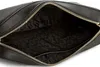 The inside of a black handbag is shown. Podgląd zdjęcia produktu