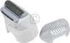 A close-up studio shot of a white electric shaver attachment and a clear plastic protective cover, isolated on a white background. Produktbild-Vorschau