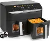 A black dual-basket air fryer is shown with one basket filled with french fries and the other showing cooked chicken. Produktbild-Vorschau
