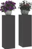 Two plant stands with potted plants on top, set against a white background. Podgląd zdjęcia produktu