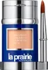 A product shot of a La Prairie Skin Caviar Concealer Foundation SPF 15 with a brush. Podgląd zdjęcia produktu