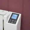 Close-up of a white electric radiator's control panel. Anteprima dell’immagine prodotto