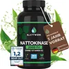 A bottle of Nattokinase supplement is shown with surrounding green leaves and water splashes, suggesting a natural product. A tag indicates a year's supply. Produktbild-Vorschau