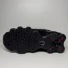 The image shows the sole of a black Nike Shox TL sneaker against a plain white background. Produktbild-Vorschau