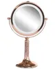 A rose gold makeup mirror with LED light on a stand. Náhľad obrázku produktu