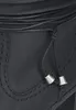 A close-up shot of the detail on a black boot, showing stitching and a drawstring with metal tips. Voir les images du produit
