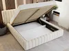 A beige upholstered bed frame with the mattress base lifted to reveal storage space underneath. Produktbild-Vorschau