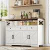 A white buffet sideboard with a wooden top, set in a kitchen or dining area. Produktbild-Vorschau